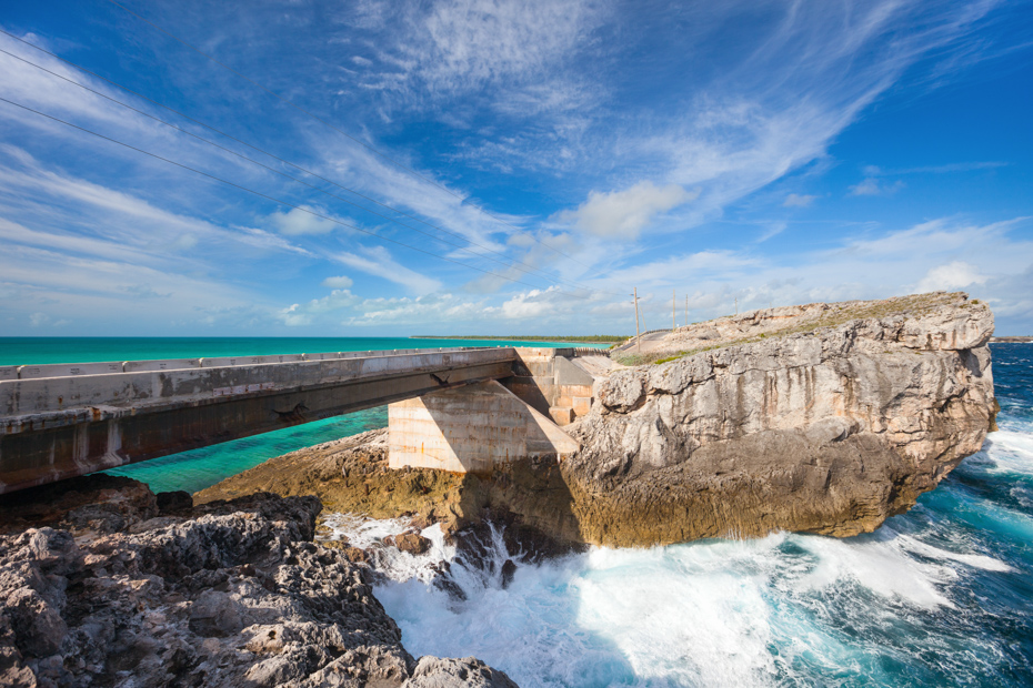 Glass window bridge on Eleuthera Bahamas Bahamas where Caribbean sea meets Atlantic ocean. Flights to North Eleuthera with Bahamas Air Tours from Florida.