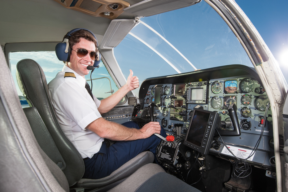 A smiling pilot in the cockpit of a small commuter airplane is giving the thumbs-up sign with his left hand. His right hand is on the control stick, and he is wearing his headset and sunglasses. The co-pilot's chair on his right is empty. Check out this Miami to Bahamas flight on a Bahamas charter you’ve always dreamed of. Imagine yourself on one of our flights from Miami to Nassau or other flights to Bahamas ready to enter paradise. Our Florida to Bahamas flights are one of the best day trips in Florida. Bahamas Air Tours gives you your guide to Day Trips to Bahamas by flights to Bahamas aboard Bahamas Air Charters to Swimming Pigs tours and the Exuma pigs on Pig Island at Pig Beach. Join one of our Staniel Cay Day trips on our Nassau to Staniel Cay day tour or opt for the Staniel Cay Day trips by the way of Bahamas Day Trips by plane. Trips to Bahamas to see pigs in Bahamas. Miami to Bahamas day trip is one of the top Florida attractions.