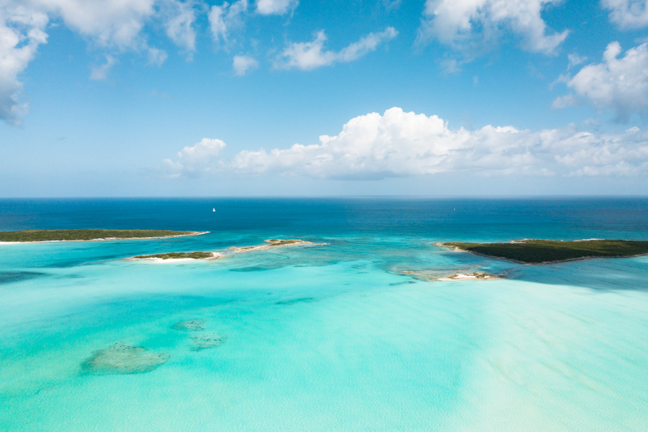 The turquoise waters of the Exuma out islands and cays in the Bahamas. The Staniel Cay resort and Exumas resorts are perfect to witness the Bahamas vacation beauty.