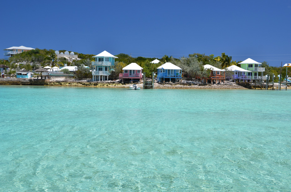 Pig Island Bahamas is next to Staniel Cay in Exuma. Staniel Cay is home to the Staniel Cay Yacht Club (pictured). Visiting the Swimming Pigs Island is only a short boat ride to Pig BEach from Staniel Cay.