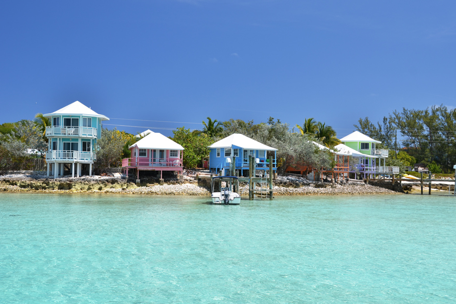 Colorful houses at Exuma Cays, Bahamas. Staniel Cay accommodation ranges from beautiful bungalows to luxurious villas - and they're all on the beach!