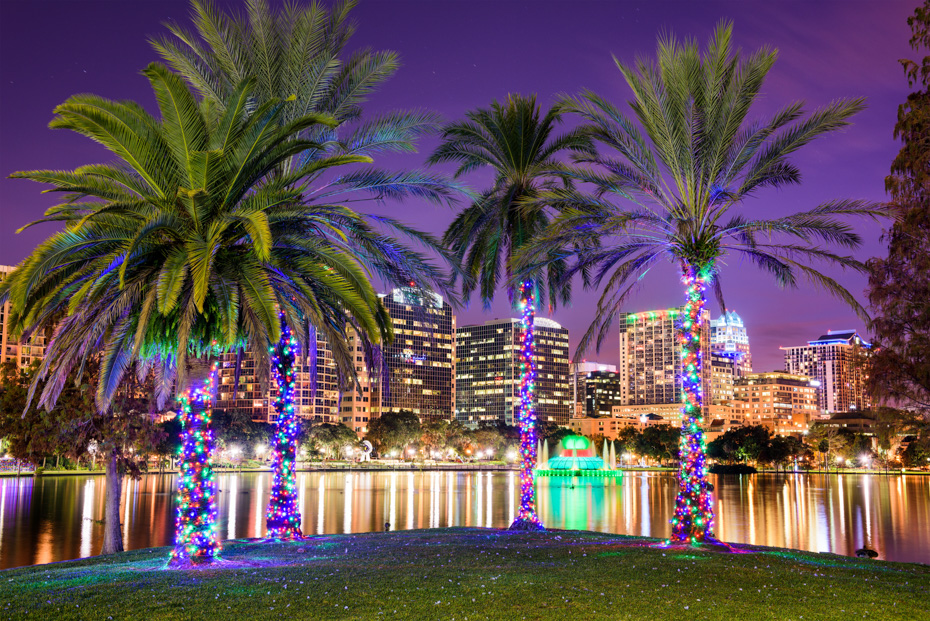 Things to do in Orlando at night: Orlando downtown skyline at Eola Lake. One of many top things to do in Orlando