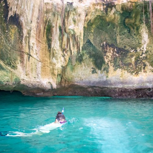 Swim into the James Bond Cave - the Bahamas Thunderball Grotto at Staniel Cay on a Florida to Bahamas Day Trip.